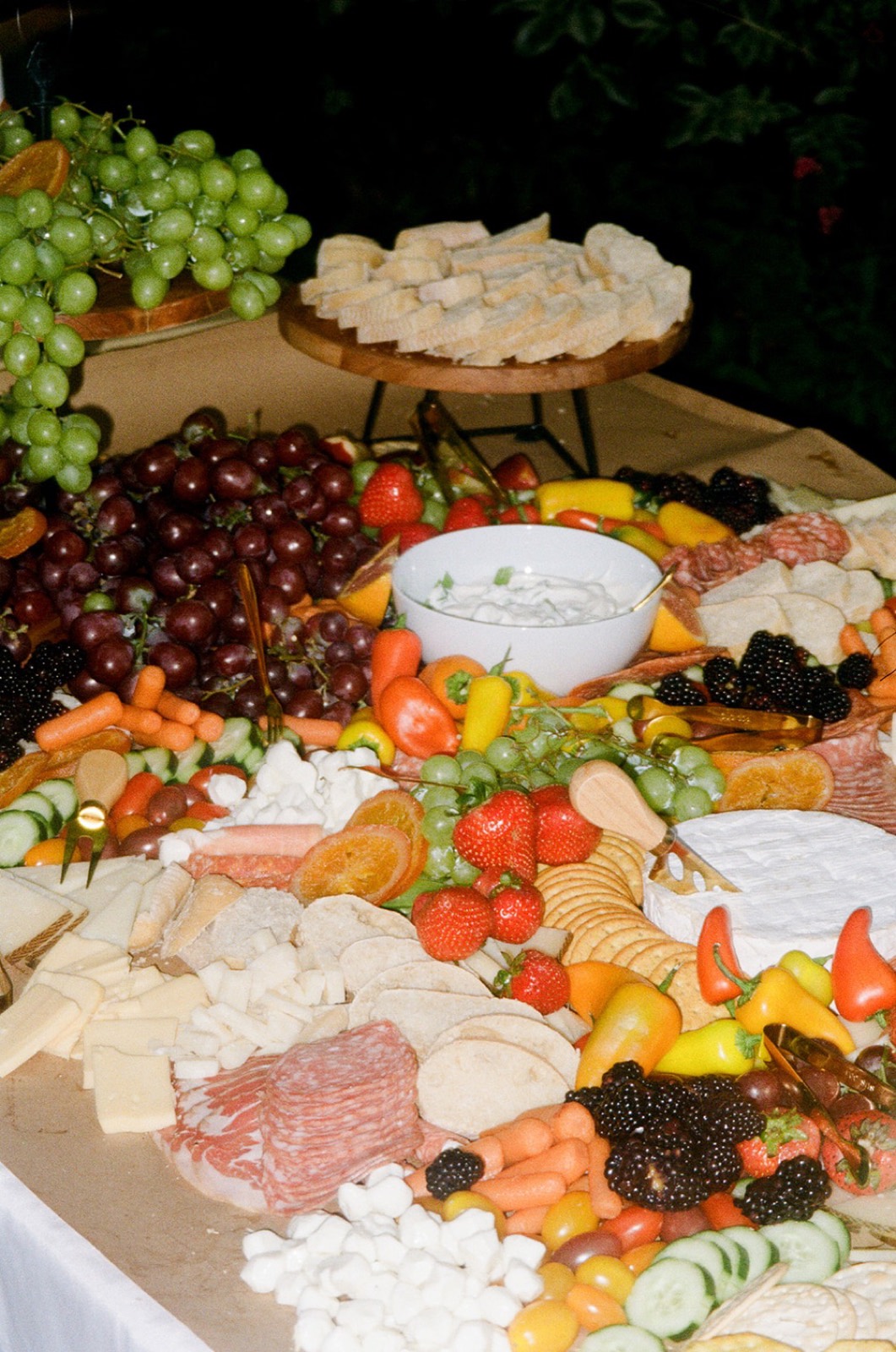 Grazing table of fruit, cheese and charcuterie