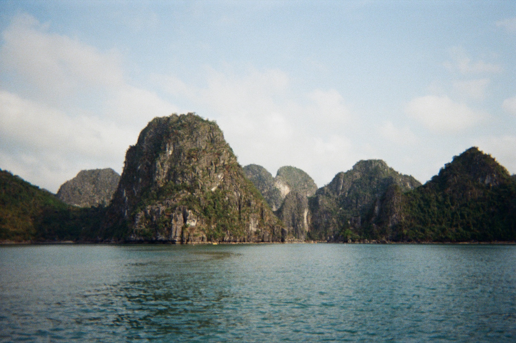 Limestone karsts rising out of the bay